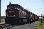 Westbound manifest crosses over to enter the yard